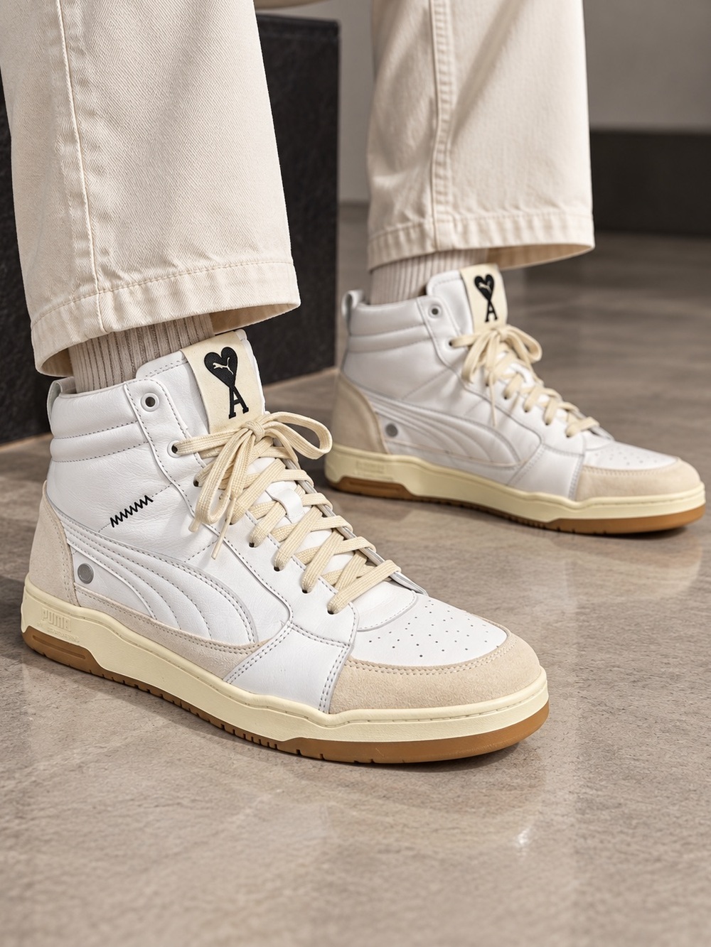 AMI x PUMA High-Top Leather Sneakers in White and Cream